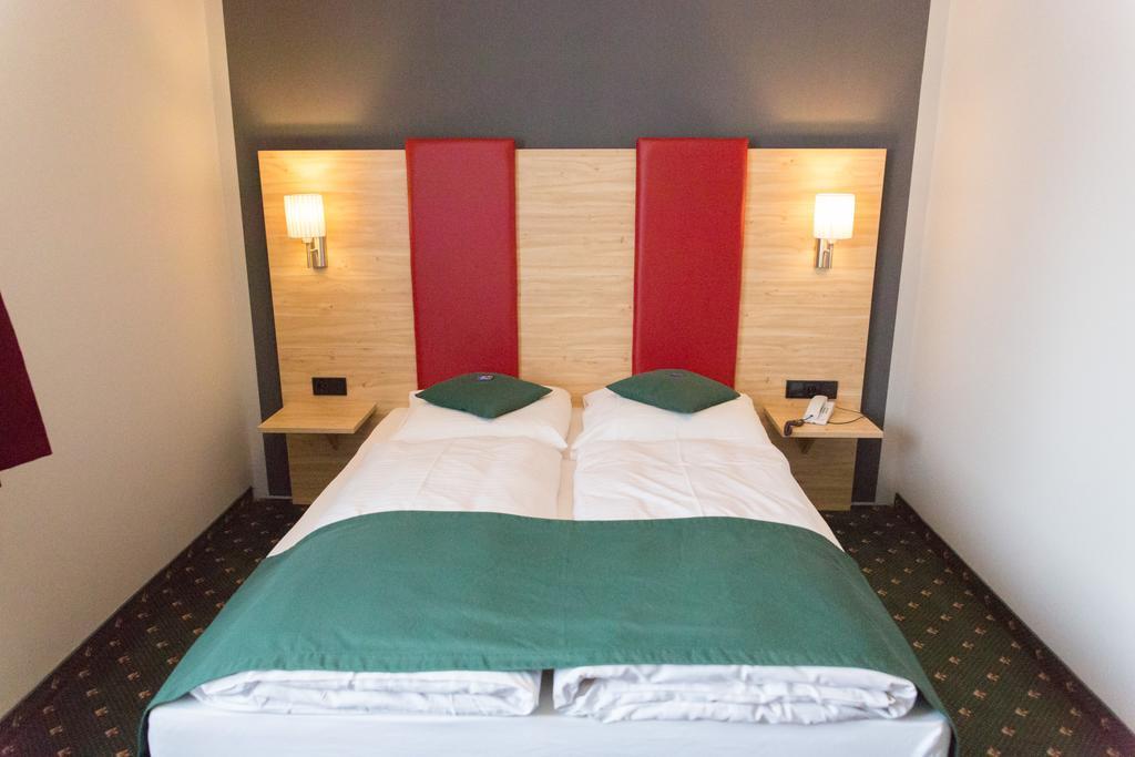 Hotel Cosima Vaterstetten Habitación foto